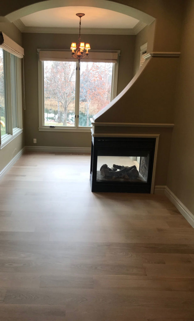 oak hardwood floors with fireplace