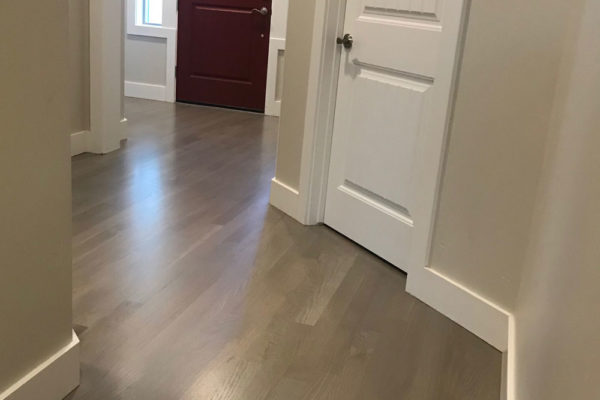 sleek oak hardwood floors in hallway