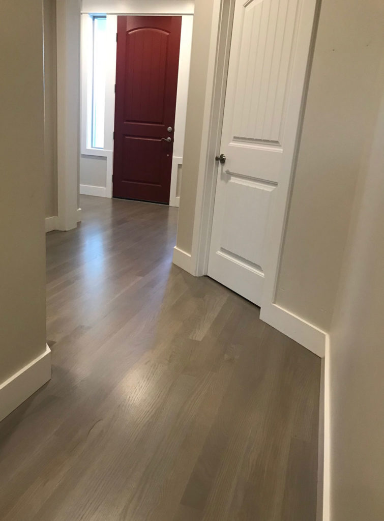 sleek oak hardwood floors in hallway