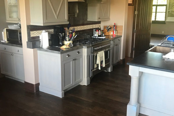 dark hardwood floors in updated kitchen
