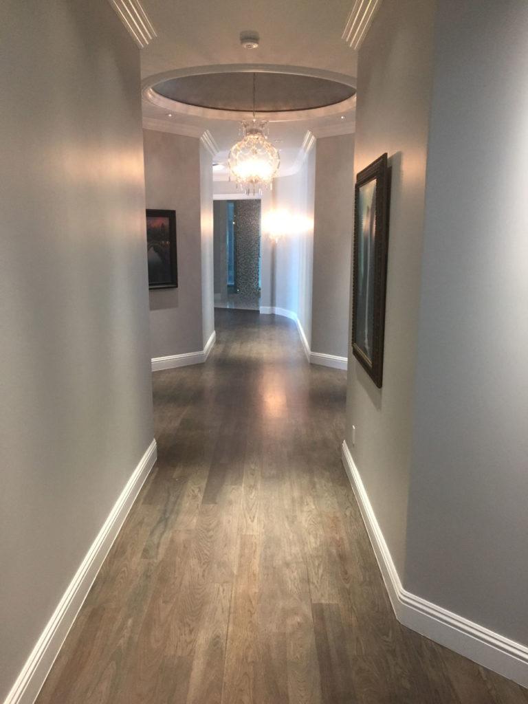 grey oak hardwood floors in modern hallway