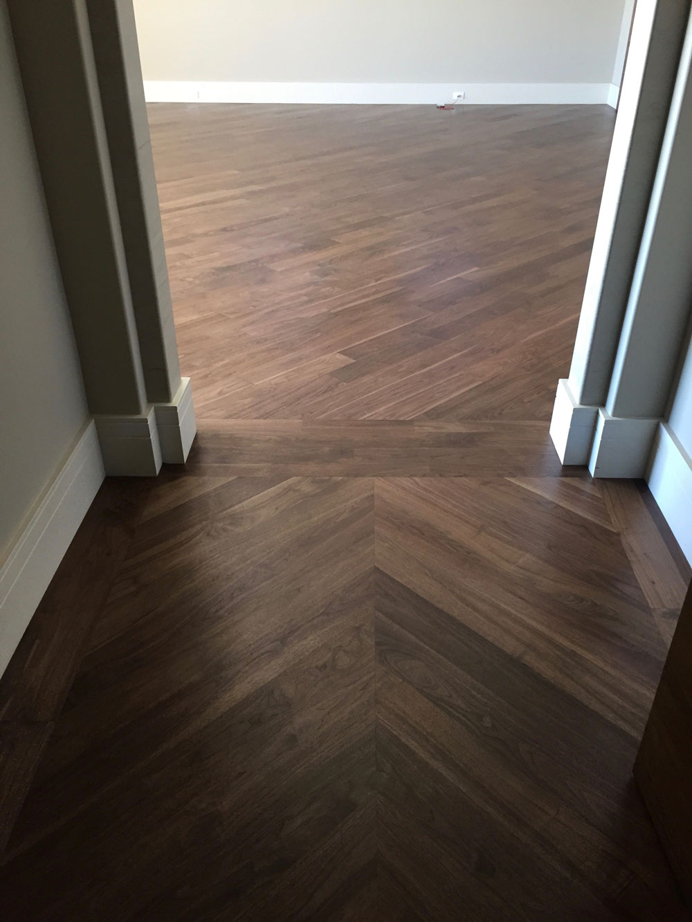 dark walnut hardwood floors in closet and bedroom