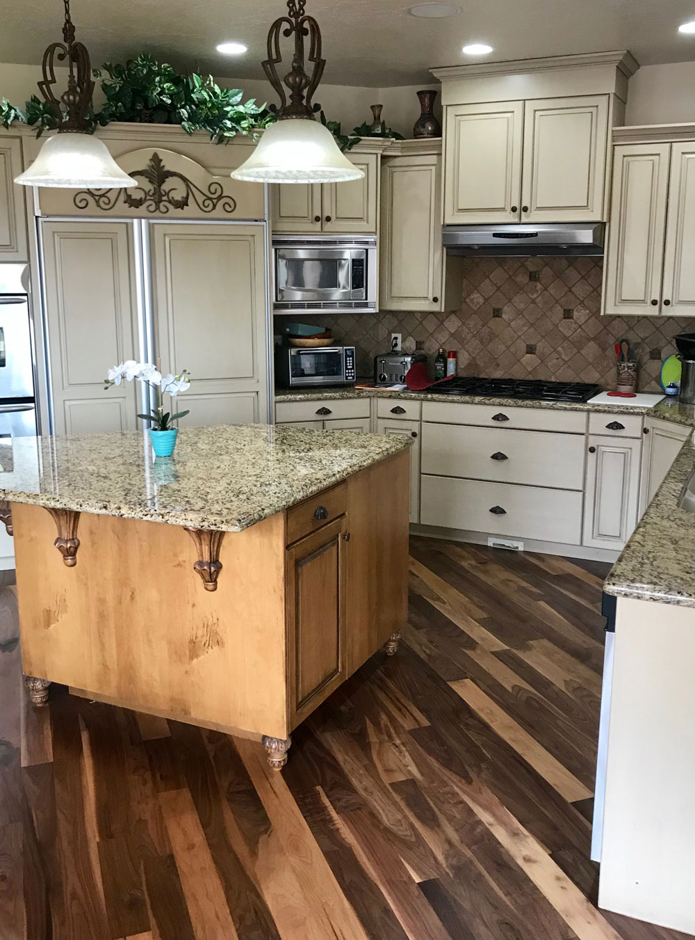 dark and light walnut hardwood floors in country style kitchen
